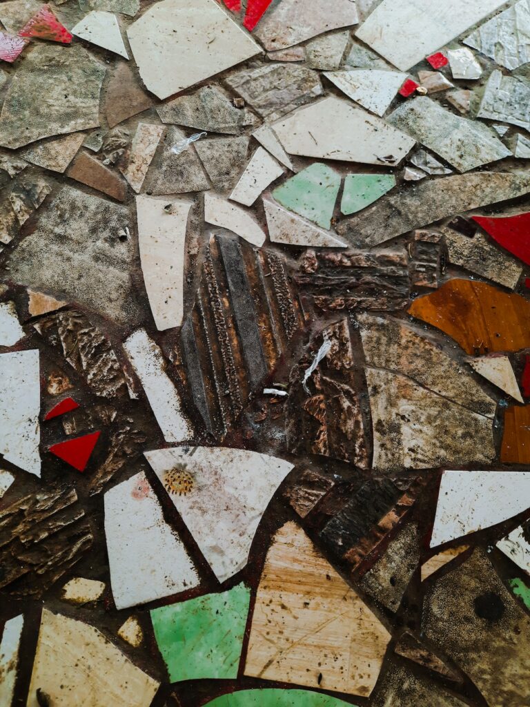 Photo by Gustavo Gutierrez: https://www.pexels.com/photo/dirty-floor-made-of-broken-tile-pieces-8454550/
